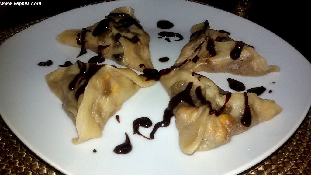 SWEET MOMOS WITH CARAMELIZED APPLE AND CHOCOLATE SAUCE 